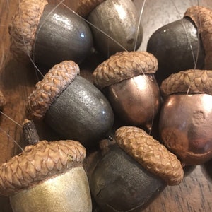 Metallic painted acorn ornaments