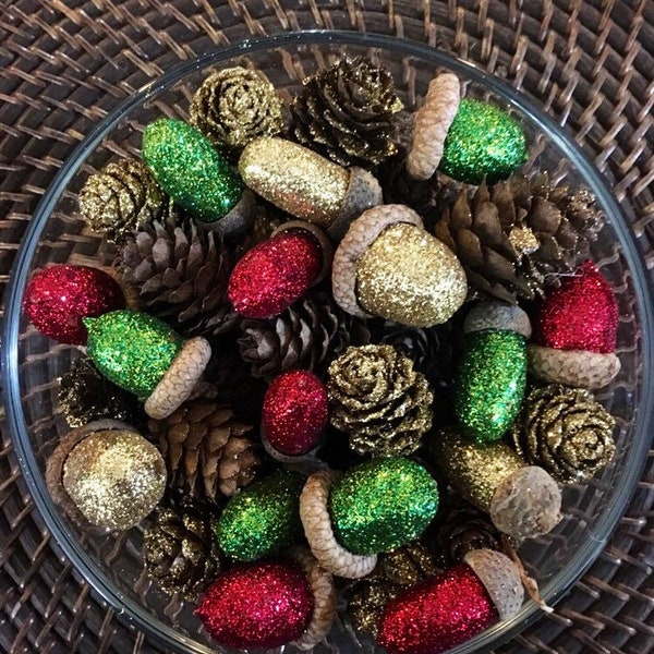 Set of red, green, and gold glittered acorns with gold glittered and regular pine cones.  Bowl or vase filler, or table accent for Christmas