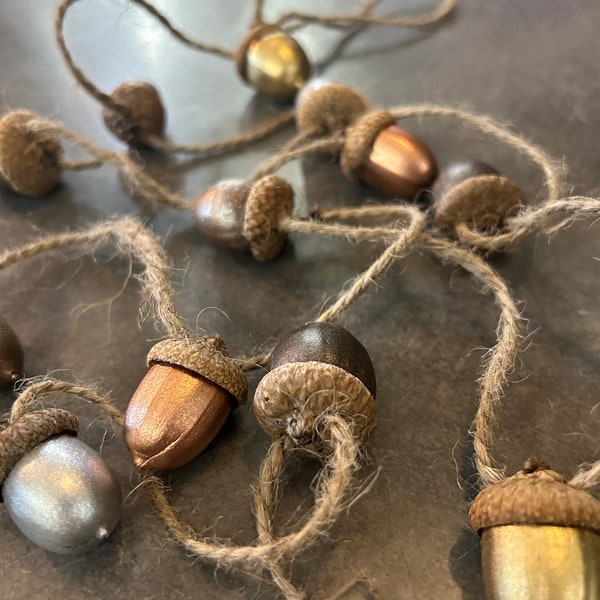 Metallic acorn and jute garland for fall/winter decorating.