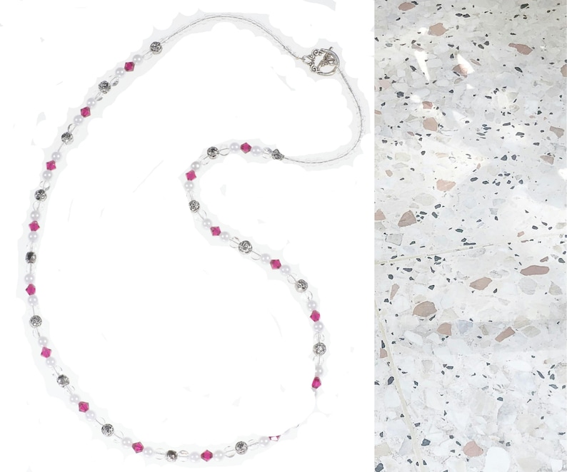 Ruby Birthstone Pearl Necklace makes a perfect handmade gift for women! This beaded birthstone necklace is designed with 6mm gemstone Swarovski crystals, 6-8mm silver beads, 5mm white pearls, 6mm flat round clear beads, and small clear seed beads