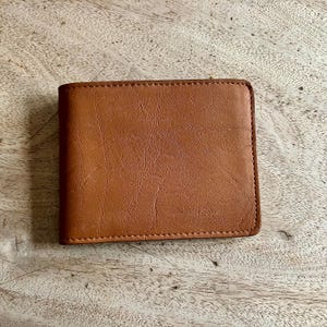 Cartera plegable Saddleman's de la marca Marlboro de la década de 1990 / Cuero genuino / Como nueva / Nunca usada / Fabricada en Brasil / Artículos vintage de Maine
