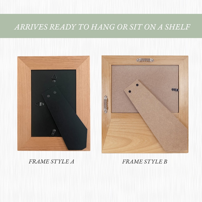 May include: Two light-colored wooden picture frames shown from the back. Frame Style A has a black backing with a black easel stand. Frame Style B has a brown backing with a brown easel stand. Text reads: ARRIVES READY TO HANG OR SIT ON A SHELF.
