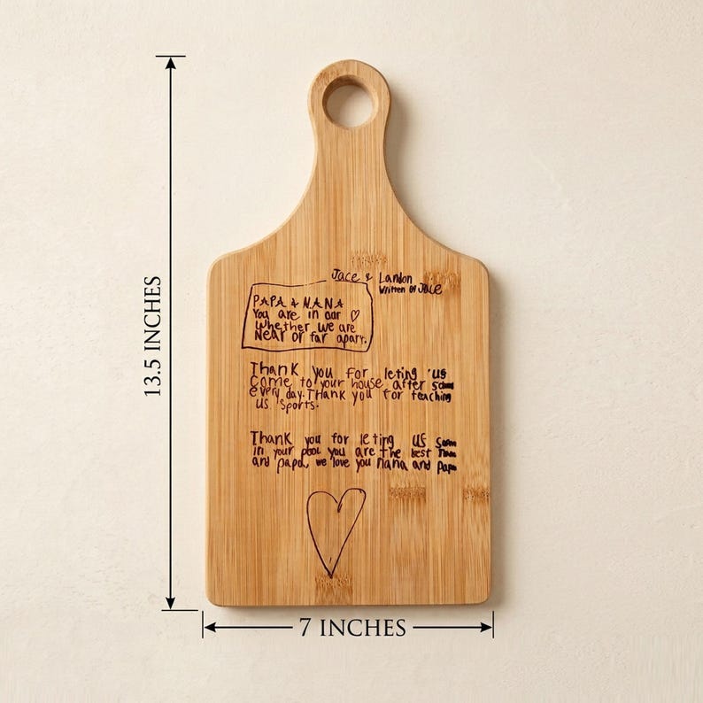 engraved Child's handwriting and drawing on a custom gift for mom cutting laser cutting board
