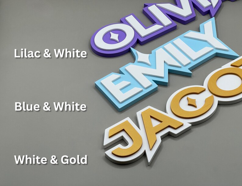 May include: Three-dimensional name signs in lilac and white, blue and white, and white and gold. The names "Olivia", "Emily", and "Jacob" are displayed in a layered design. The text "Lilac & White", "Blue & White", and "White & Gold" are also visible.