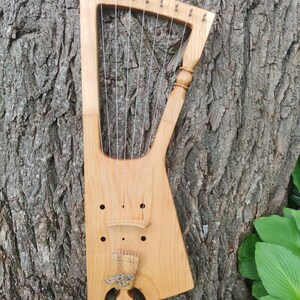 Michal, a 9 string fantasy lyre with unique carved detail