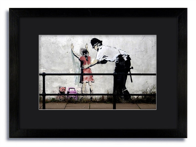 Banksy policeman searching girl mounted & framed print Etsy