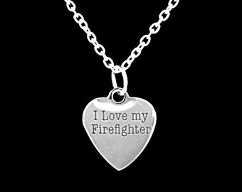 May include: Silver necklace with a heart-shaped pendant that says "I Love my Firefighter".