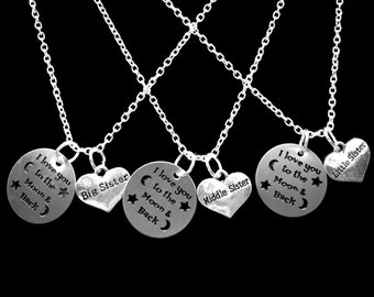 May include: Three silver necklaces with pendants that say "I love you to the moon and back" with the words "Big Sister", "Middle Sister", and "Little Sister" on the hearts.