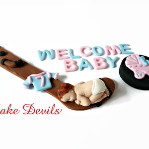 Hockey Baby Boy Fondant Cake Topper, Sleeping Baby Shower Hockey Cake Topper, Handmade Edible, Hockey Stick, Hockey Puck. Baby cake topper
