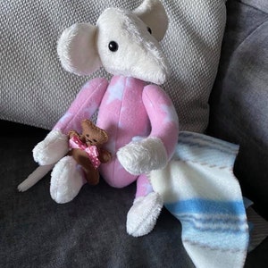 Rat plushie in onesie
