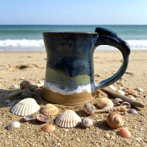 Handmade NC Pottery Whale Tail Mug. Glaze resembles Beach scene.