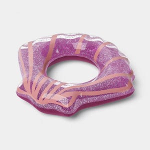 May include: An inflatable pool float shaped like a seashell, constructed from translucent purple vinyl material embedded with silver glitter. The design features opaque light pink radial stripes that extend from the center to the outer edge.