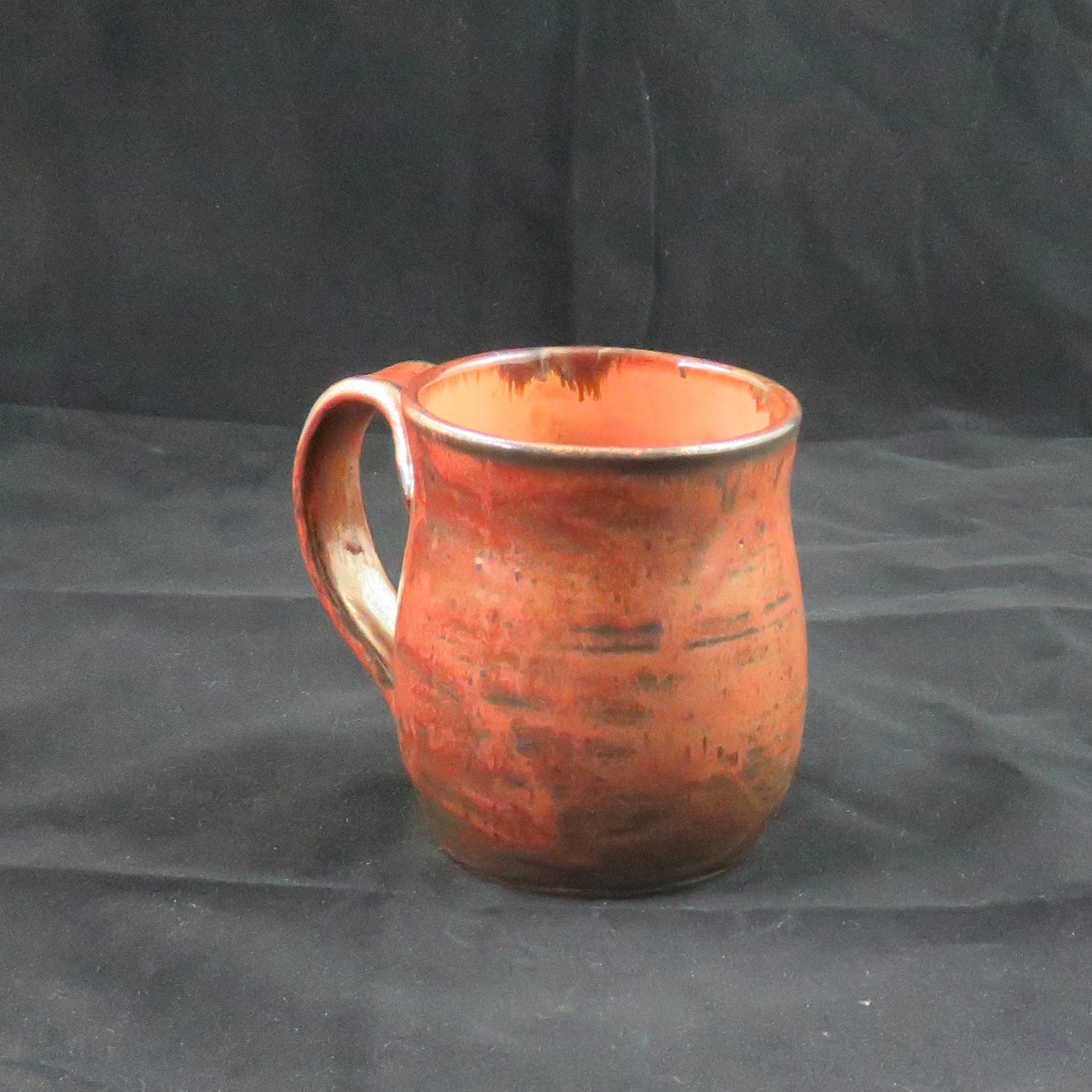 Beautiful Ancient Copper pottery mug with tangelo orange interior