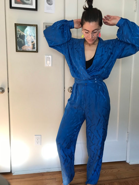 blue silk jumpsuit textured material long sleeve d