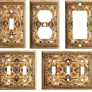 May include: Set of five decorative wall plates with a brown, gold, and white geometric pattern. The plates are designed to fit over light switches and electrical outlets.