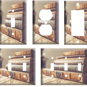 May include: Set of five light switch and outlet covers featuring a stack of vintage books on a wooden surface. The covers are available in a variety of sizes to fit standard light switches and outlets.