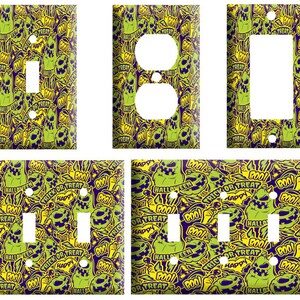 May include: Set of six light switch and outlet covers featuring a Halloween-themed pattern with green and purple ghosts, pumpkins, and the words "Boo!" and "Trick or Treat!"