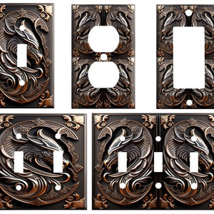 May include: Set of six decorative wall plates featuring a stylized dragon design in a bronze finish. The plates are designed to fit over standard light switch and outlet covers.