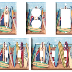 May include: Set of six light switch and outlet covers featuring a colorful illustration of surfboards on a beach. The covers are made of durable plastic and are easy to install.