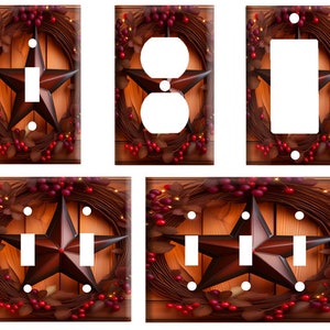 May include: Set of four light switch and outlet covers featuring a rustic wooden background with a brown star and a red berry wreath.