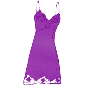 May include: A purple slip dress with thin straps and a V-neckline. The neckline and hem are trimmed with white lace. The dress has a simple, elegant design.