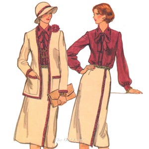 May include: Illustration of two women's outfits. One is a cream-colored skirt suit with burgundy trim, a matching hat, and a burgundy blouse. The other is a burgundy blouse with a cream-colored skirt with burgundy trim. Both outfits have a vintage style.