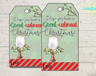 May include: Two green gift tags with a white candle and green holly design. The text on the tags reads "I hope you have a Scent-sational Christmas!" and "Love."