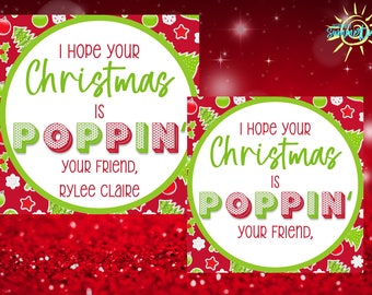 May include: Two green and white Christmas gift tags with red and white polka dots. The text on the tags reads "I hope your Christmas is poppin' your friend, [name]"
