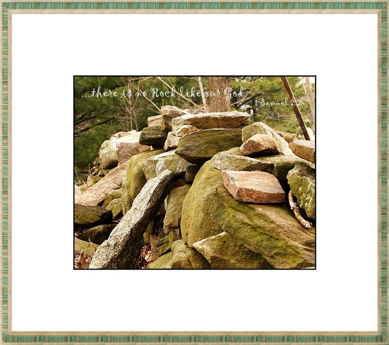 Pu&ograve; includere: Un cumulo di rocce in un ambiente boschivo con il testo "...there is no Rock like our God 1 Samuel 2:2" sovrapposto all'immagine.