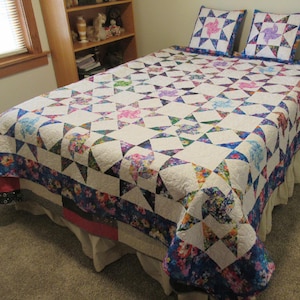 Quilt and matching Throw pillow cases only - Whirligig Star
