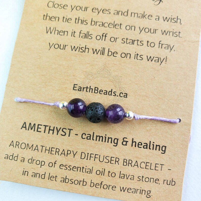 May include: Amethyst aromatherapy diffuser bracelet with lava stone beads. Add a drop of essential oil to the lava stone, rub in and let absorb before wearing.  "Close your eyes and make a wish, then tie this bracelet on your wrist. When it falls off or starts to fray, your wish will be on its way!" EarthBeads.ca