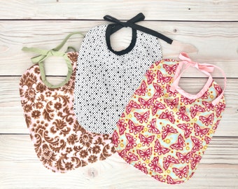 Reversible Girls Large Tie Closure Bib Set of 3