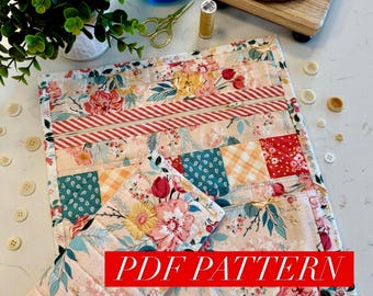 Quilted craft zipper bag with needle minder book sewing pattern