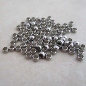 stainless steel crimp beads 2.3mm wide, 1.4mm hole