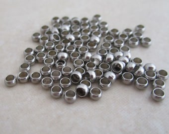 stainless steel crimp beads 2.3mm wide, 1.4mm hole