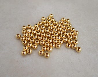 small 2.4mm gold plated brass round beads