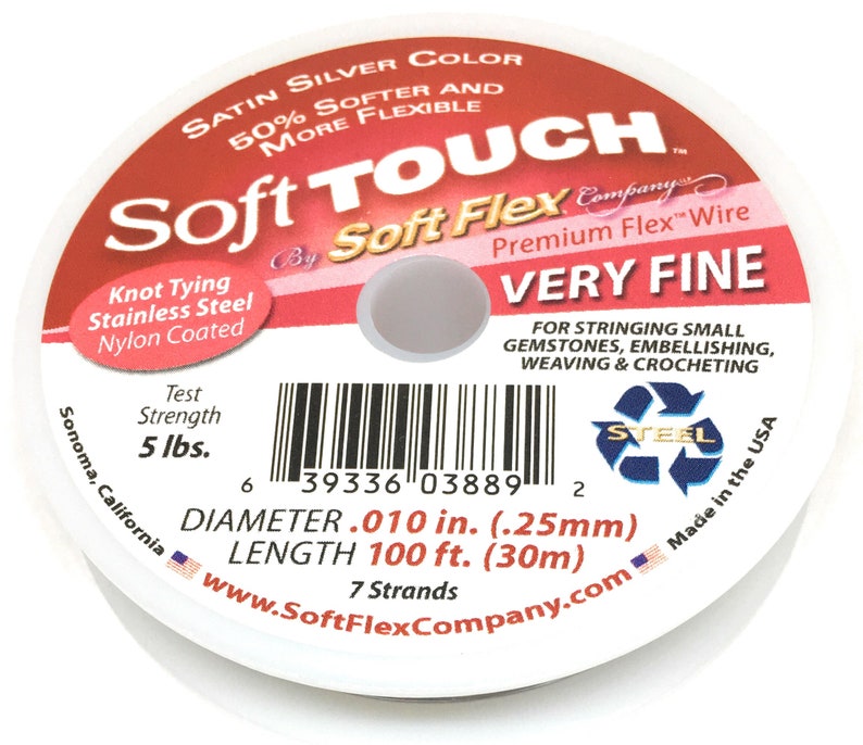 May include: A spool of satin silver Soft Flex Company Premium Flex wire, very fine, for stringing small gemstones, embellishing, weaving and crocheting. It is 50% softer and more flexible than other wires. The spool is 100 feet long and has a diameter of 0.010 inches. It is made in the USA and has a test strength of 5 lbs.