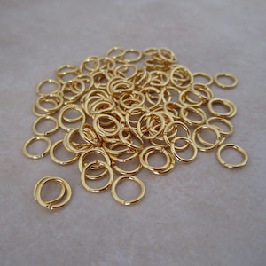50 gold plated 6mm jump rings brass open 21 gauge image 1