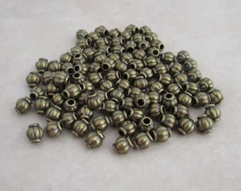 antique bronze 4mm lantern spacer beads tibetan style