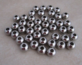 stainless steel 6mm wide x 4.7mm round seamless beads 304 hypoallergenic 2mm hole