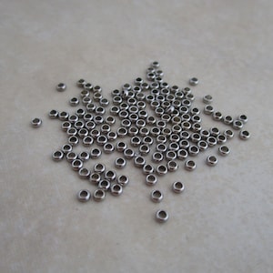 100 stainless steel crimp beads 1.8mm wide with 1mm inner hole