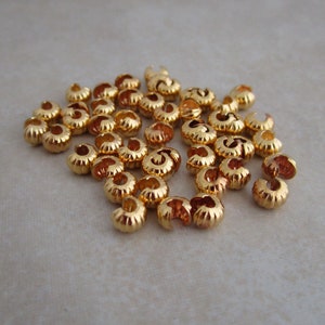 50 gold plated 4mm corrugated crimp bead covers