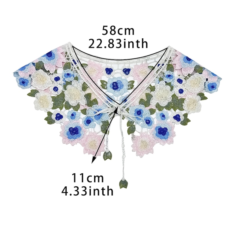 May include: White lace collar with blue and pink floral embroidery. The collar measures 58 cm in length and 11 cm in height.