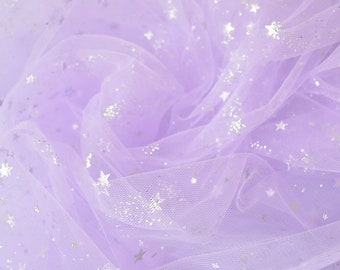 May include: Purple tulle fabric with silver glitter stars. The fabric is soft and sheer, and the stars are scattered randomly across the surface.
