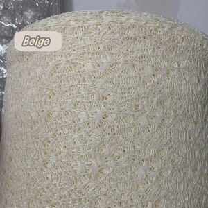 May include: Beige crochet lace fabric roll. The fabric has a delicate, open weave pattern.
