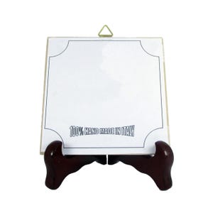 a wooden stand with a white sign on it