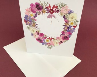 Send your love with this floral heart greeting card, with envelope. A7 size, 5” x 7”. Print made from my original pressed flower design.