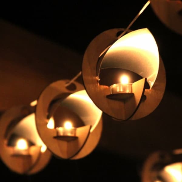 Skyboats: Hanging Lantern String Lights.  Tealight Candle Lit kits with tin roof reflectors. Outdoor Party Lights!