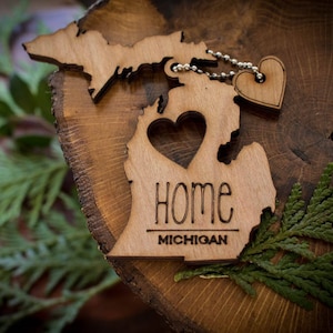 All US State Ornaments. Heart & Home. Show love for the place that stole your heart with these Ornaments, Keychains, and tokens of love Michigan