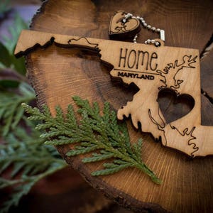 All US State Ornaments. Heart & Home. Show love for the place that stole your heart with these Ornaments, Keychains, and tokens of love Maryland